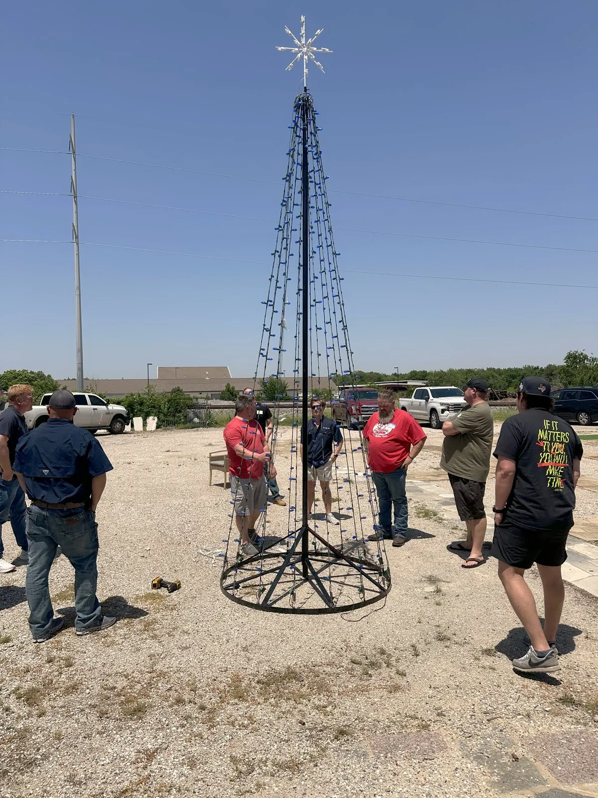 Building a mega-tree frame on site before the lights go on, installed by South Custom Lighting in North Texas
