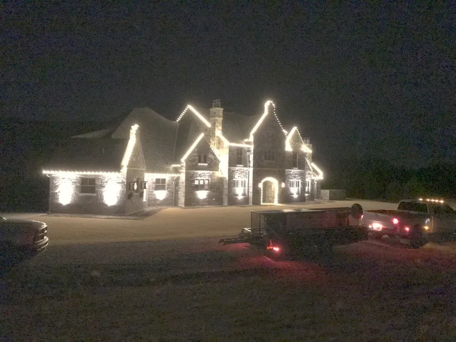 Multiple gables picked out separately in warm white, installed by South Custom Lighting in North Texas